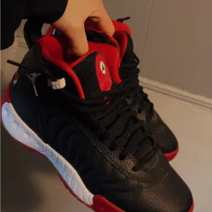 Black and Red High-Top Sneakers
