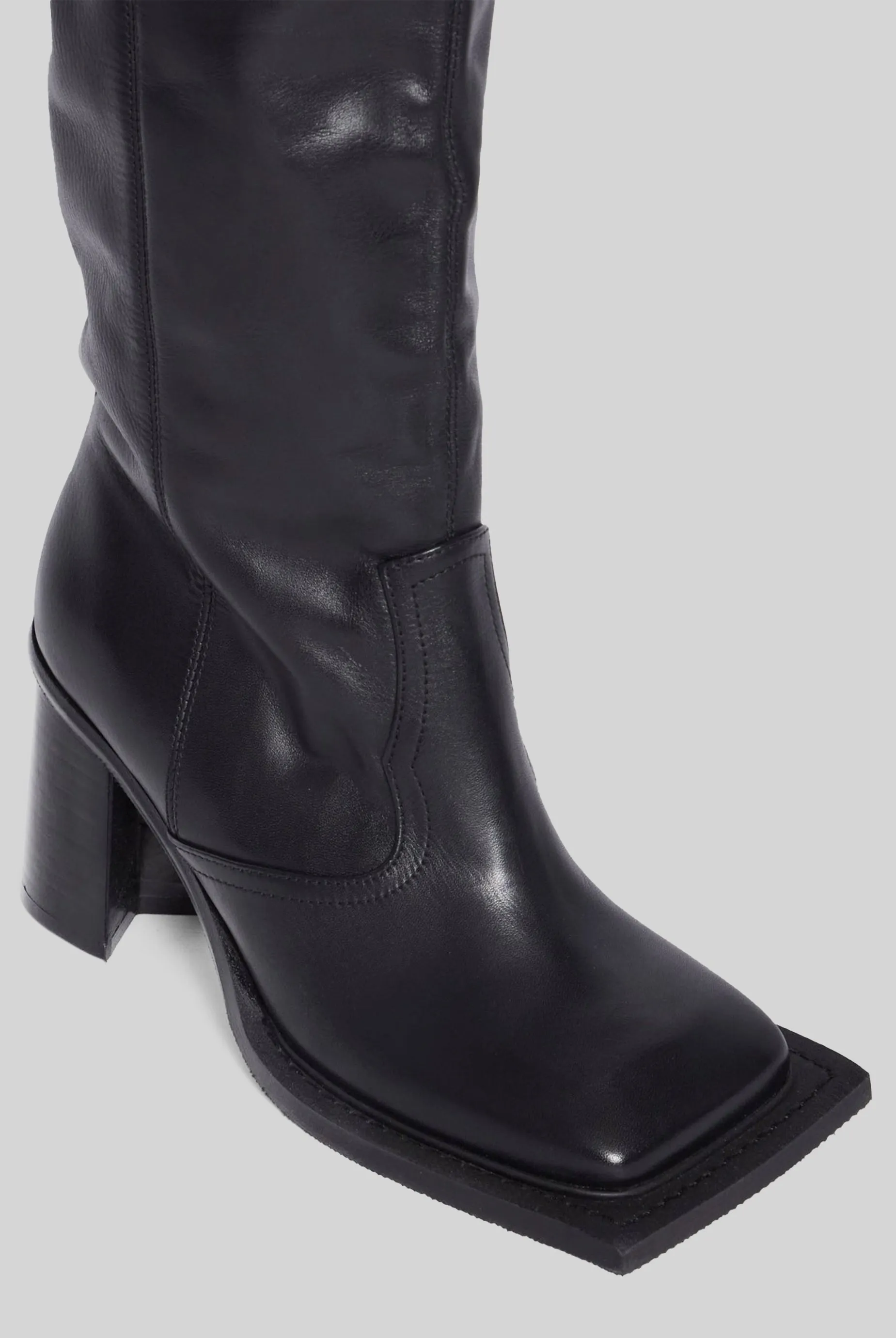 Howling Knee High Boots in Black