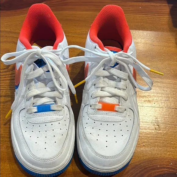 Nike White and Red Sneakers with Low-Top Design and Perforated Toe