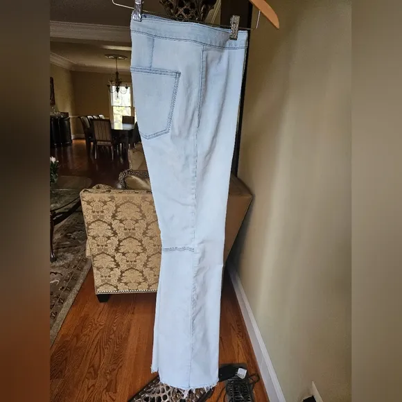 NWOT We The Free light wash boot cut jeans