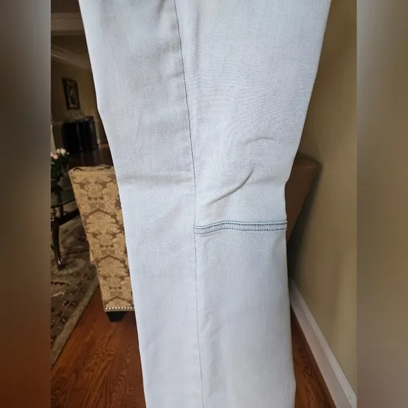 NWOT We The Free light wash boot cut jeans