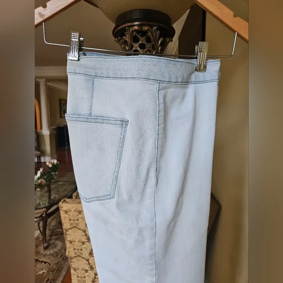 NWOT We The Free light wash boot cut jeans