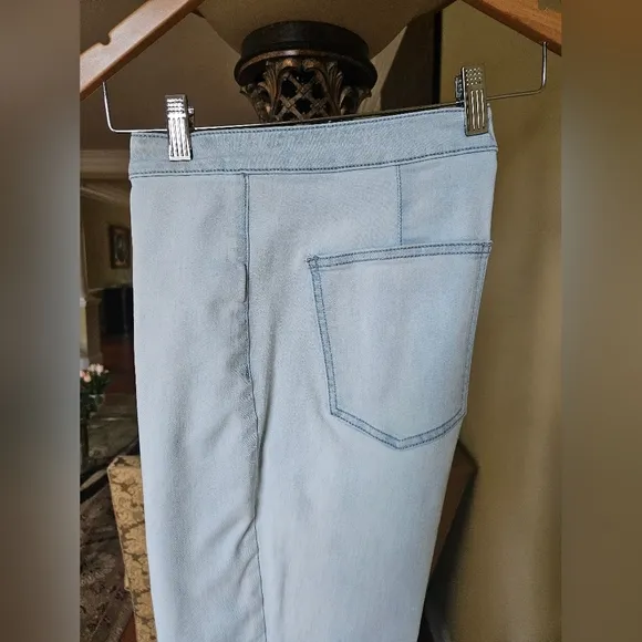 NWOT We The Free light wash boot cut jeans